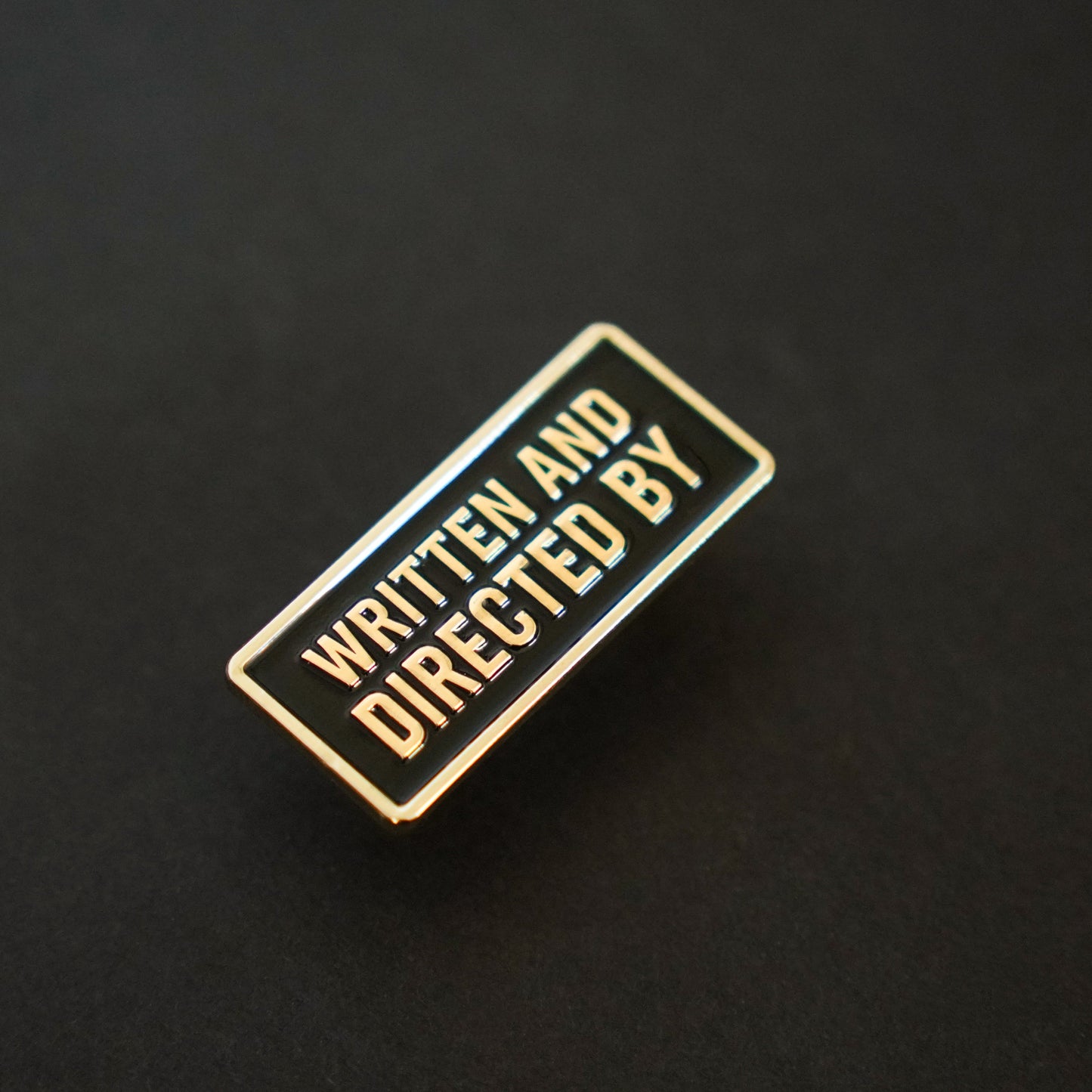 Written and Directed by Credit Enamel Pin